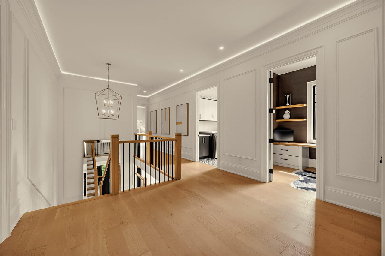 Upper landing looking over the stair, with the study open through double doors