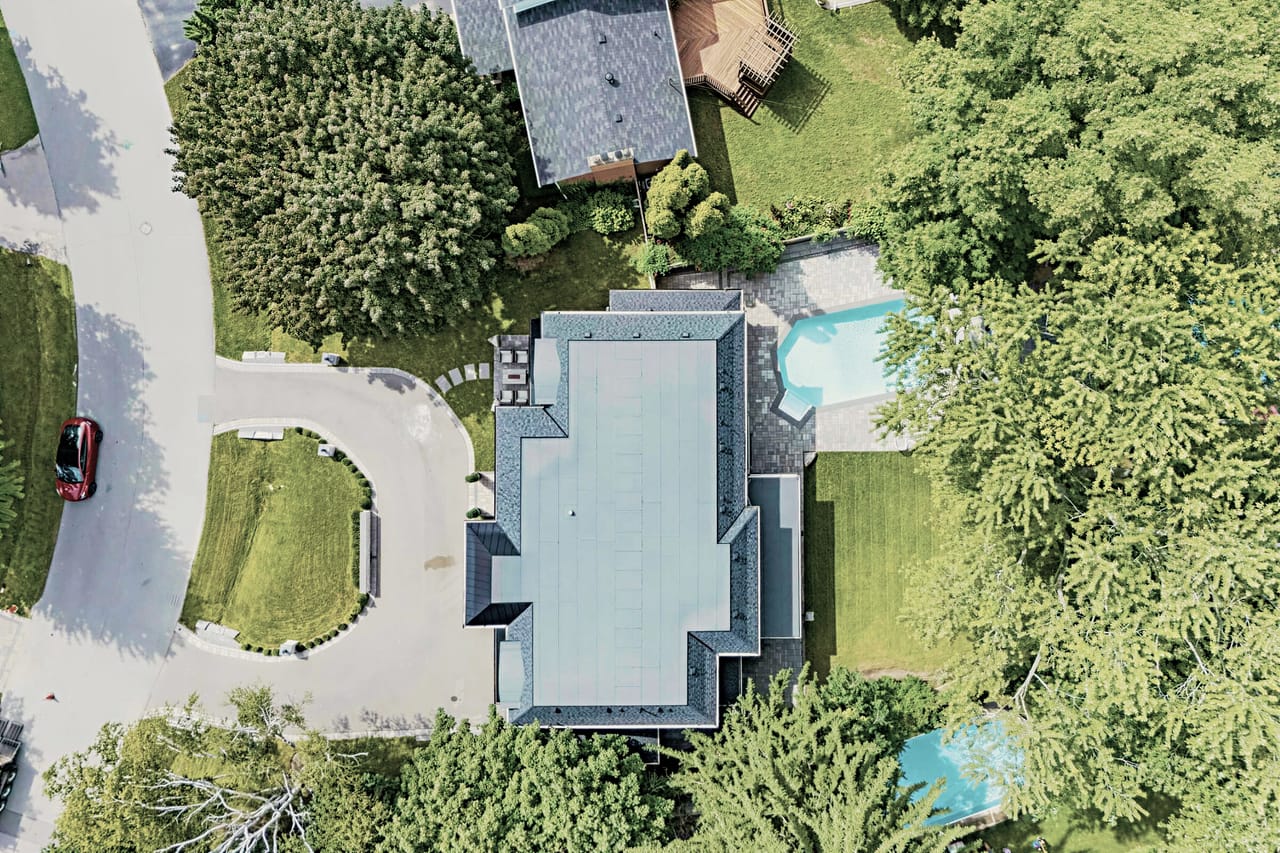 Directly above the house, showing the full footprint and the pool terrace behind it