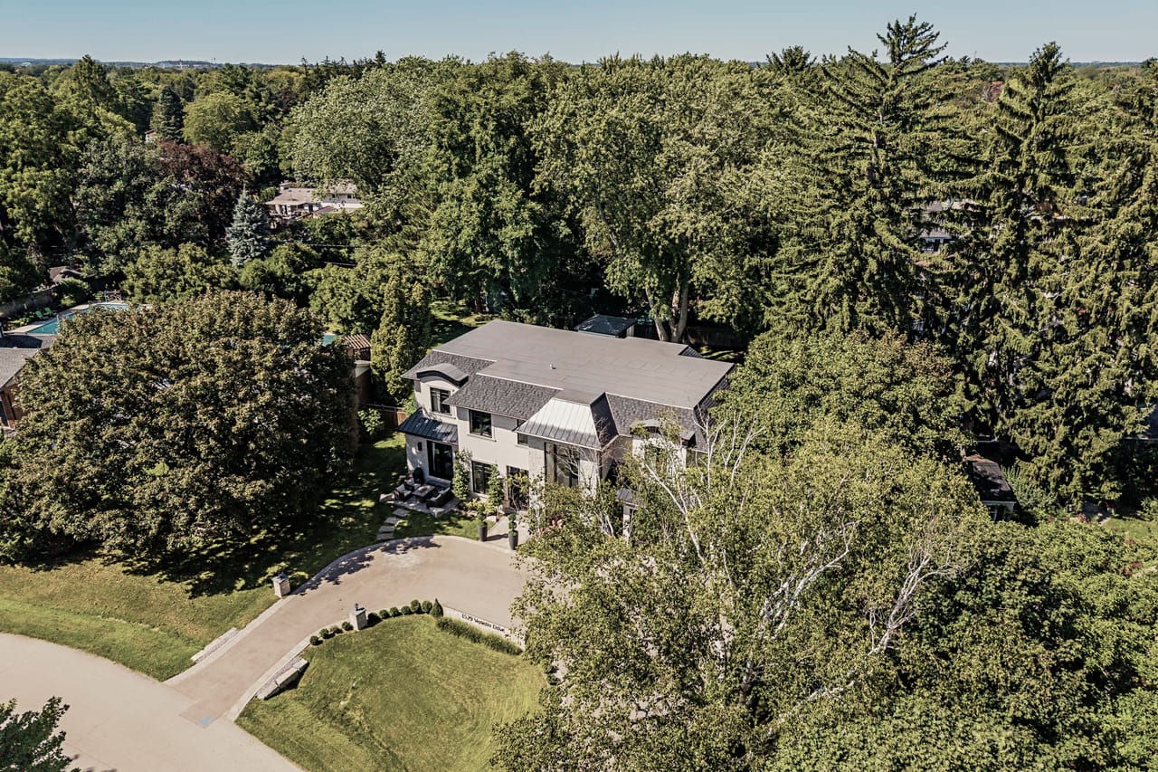Low aerial over the front of the estate and the curve of Venetia Drive