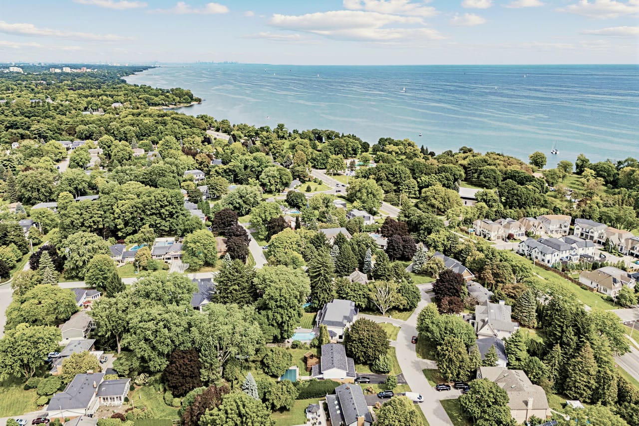 Over the treetops of the neighbourhood toward the open water of Lake Ontario