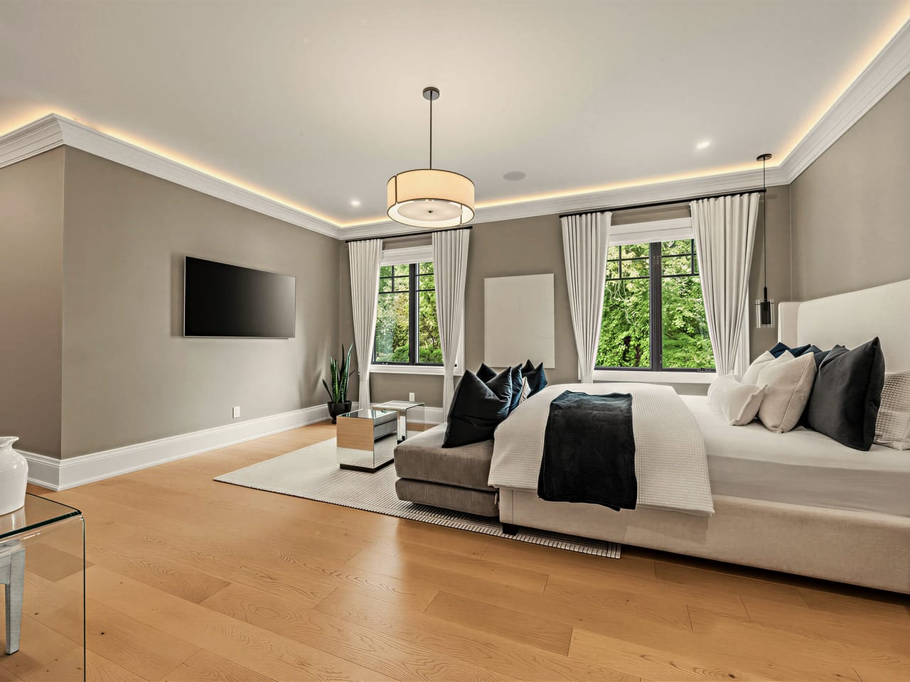 The primary bedroom from the entry, the room running the depth of the house